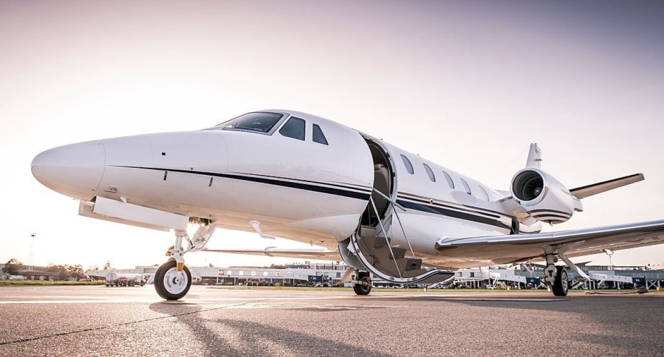 Luxury business jet with open door ready for passenger boarding